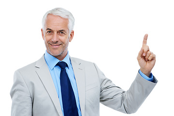 Image showing Senior man, pointing and portrait with suit in studio, white background and sharing future ideas. Businessman, presentation and announcement with wisdom, experience and advice for business careers.