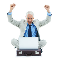 Image showing Studio, laptop and mature businessman with success, celebrating and happy for online deal or winning. Senior entrepreneur, computer and fist pump for profit and excited for bonus by white background