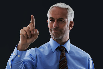 Image showing Business man, finger and digital interface for choice isolated on a black studio background. Touch, professional and hand gesture on screen, click button and future innovation of tech for senior CEO