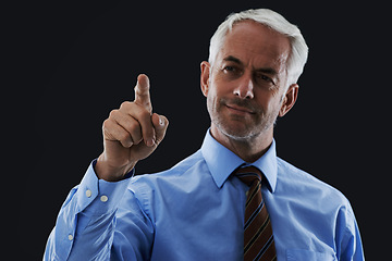 Image showing Business man, finger or click interface for choice isolated on black studio background. Touch, professional or hand gesture on screen, press button or future innovation of digital tech for senior CEO