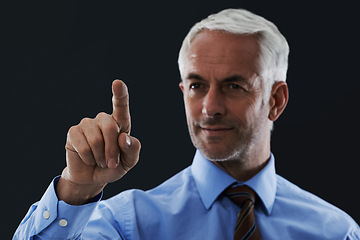 Image showing Business man, finger and digital interface for choice isolated on a black studio background. Touch, professional and hand gesture on screen, click and future innovation of technology for senior CEO