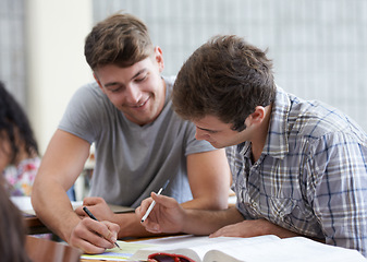 Image showing Students, help and reading textbook in university class for education for academic exam or college, scholarship or studying. Men, information and lesson for course or lecture, assignment or school