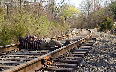 Image showing Laying on the Rails