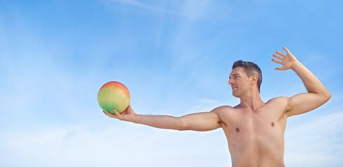 Image showing Beach, volleyball and man with fitness, summer and weekend break with recreation and activity. Person, athlete and guy with fun and playing with workout and hobby for wellness, sunshine or healthy