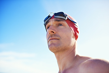 Image showing Swimming, goggles and man with thinking, cap and swimmer with wellness and summer break with getaway trip. Person, beach or athlete with protection and seaside with sunshine and fitness with vacation