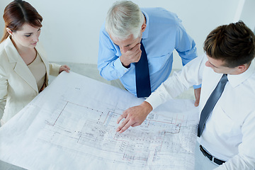 Image showing Blueprint, architecture or top view of team planning project, maintenance or renovation in meeting. Civil engineering, people building or group of designers with floor plan for property development