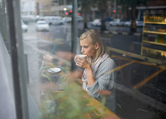 Image showing Coffee shop, laptop and woman with drink for remote work in window for internet, website and research. Restaurant, relax and girl on computer for freelance career, working and email with cappuccino