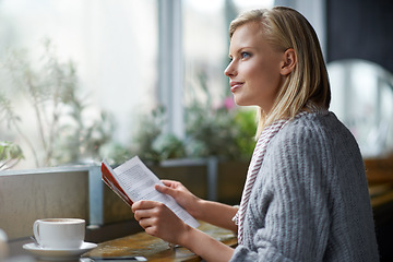 Image showing Coffee shop, reading and woman with book thinking by window with drink, cappuccino and latte. Cafeteria, restaurant and happy person with story, literature and novel for relaxing, learning and hobby