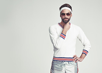 Image showing Man, portrait and retro tennis fashion in studio for vintage style with 80s look, workout and sports gear. Sunglasses, training and exercise for fitness, unique and male person with mockup space