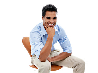 Image showing Business man, portrait and smile in studio, corporate employee and career in sales on white background. Professional, positivity and pride with happy salesman sitting in chair and confidence
