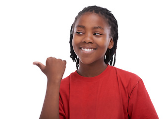 Image showing African child, studio and smile for promotion, show and point at mockup advertisement. Black kid, white background and gesture at open space, sale and confidence for idea and thought for marketing