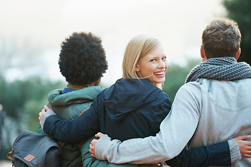 Image showing College, friends and portrait with hug or smile for bonding, relax and break on campus with diversity. University, people and happy with embrace for support, education and learning fun with rear view