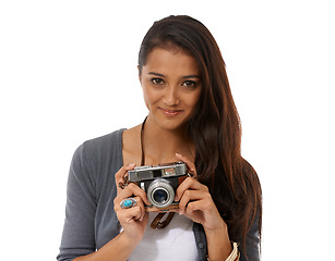 Image showing Woman, photographer and vintage camera in studio, portrait and pride for picture or production. Happy female person, retro equipment and confident on white background, photoshoot and lens for hobby