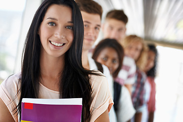 Image showing Girl, portrait and smile at university for studying, education and campus for commitment. Female student, school and row for scholarship at academy, learning and college line for knowledge and future