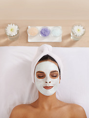 Image showing Woman, face mask and cosmetology for beauty in spa, detox and cosmetic treatment for salon facial. Person, relax and aromatherapy with natural clay on skin, calm and skincare for dermatology on bed