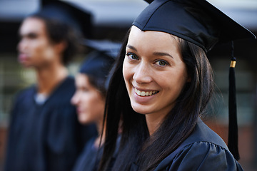 Image showing Woman, student and portrait at graduation, college and university success or achievement. Happy female person, smile and pride at outdoor ceremony, higher education and knowledge in qualification
