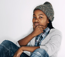 Image showing Boy, fashion and portrait with gen z, trendy and cool style with a hat in a studio. Child, accessory and African male kid from Chicago with confidence and modern youth outfit with white background