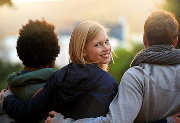 Image showing College, friends and portrait with hug or happy for bonding, relax and break on campus with diversity. University, people and smile with embrace for support, education and learning fun with rear view