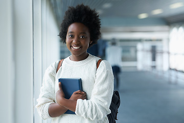 Image showing African girl, portrait and hallway of college with smile from happiness of education in academy. Student, learning and notebook on hand with information for class in school campus and scholarship