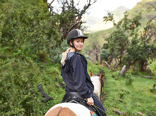 Image showing Riding, horse and portrait of woman in forest or journey on path in nature for adventure and equestrian sport. Training, animal and person travel on trail with pet in countryside, woods and summer