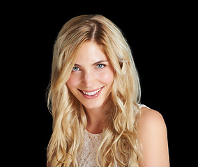 Image showing Beauty, hair and happy portrait of woman with curly hairstyle, shine and keratin treatment isolated in dark studio. Salon styling, smile and face of girl with healthy haircare on black background.