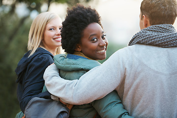 Image showing College, friends and happy with hug outdoor for bonding, relax and break on campus with diversity. University, people and smile with embrace for support, education and learning fun with scholarship