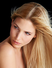 Image showing Wind, hair care and skincare of woman, beauty and thinking isolated on a black studio background. Hairstyle, makeup and blonde model in breeze, hairdresser and salon for facial treatment cosmetics