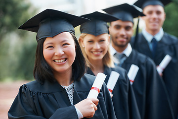 Image showing Graduation, certificate and portrait of group at college ceremony in line with diploma and happiness. University, success and class of people with degree achievement, award and education scholarship
