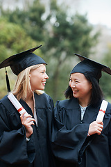 Image showing Graduation, certificate and diversity with student friends outdoor on campus for ceremony at university. Education, smile and success with graduate women at college together for scholarship event