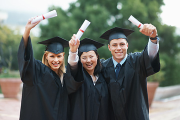 Image showing College, celebration and portrait of group at graduation with diploma, certificate and happiness. University, success and people with pride for achievement of degree in education on scholarship