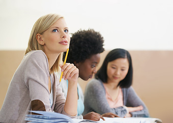 Image showing Student, woman and planning in university classroom, information and notes for research. People, thinking and knowledge in education for learning, problem solving and ideas for solution in assessment