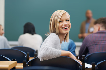 Image showing Portrait, students and woman with knowledge, funny and university with learning and studying. Face, people and girl in lecture hall with academy, education and scholarship in a classroom and happy