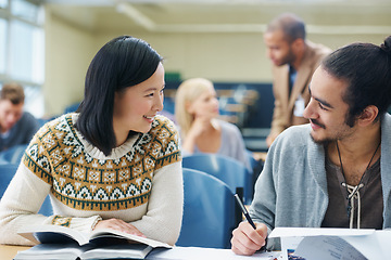 Image showing Discussion, college and students in classroom for studying with text book for test or exam. Conversation, writing and young people working on university assignment together in lecture hall at academy