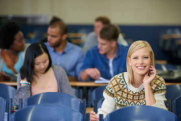 Image showing University, students and happy portrait in lecture, classroom and learning in course for education. College, campus and people studying for test in school and reading project, research or knowledge