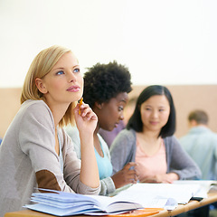 Image showing Student, university and woman thinking in classroom, information and notes for studying. People, books and knowledge in education for learning, problem solving and ideas for solution in assessment