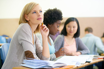 Image showing Student, woman and thinking in university classroom, information and notes for studying. People, planning and knowledge in education for learning, problem solving and ideas for solution in assessment