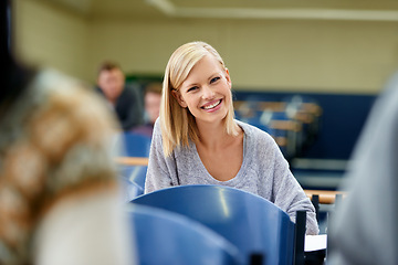 Image showing Portrait, students and woman with education, lecture and university with learning and knowledge. Face, people and girl writing and books with academy with exam and scholarship in a classroom or happy