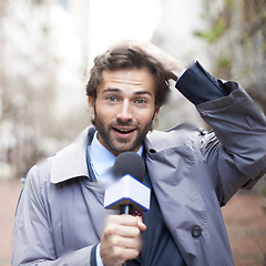 Image showing Portrait, news reporter and interview with man, microphone or journalism with broadcast or live streaming. Raining, person or media with breaking story or feedback with weather or anchor with review