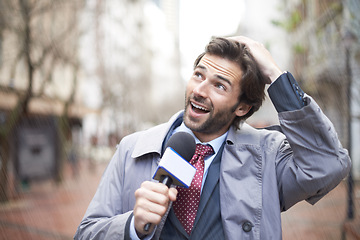 Image showing Weather, man and reporting on rainstorm, smile and journalism with media and breaking news. Feedback, person and employee with a microphone or professional in New York city with information or anchor