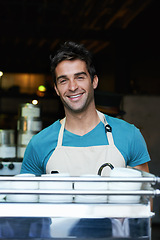Image showing Portrait, smile and man in cafe with coffee machine with pride for small business owner in hospitality. Service, waiter or happy barista in restaurant with confidence, face and entrepreneur in store.
