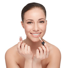 Image showing Woman, face and skincare for beauty, lipstick and makeup with cosmetology and wellness on white background. Portrait, cosmetic product for lips and clean skin, glow or shine with smile in studio