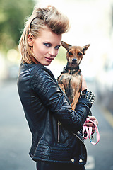 Image showing Woman, portrait and leather jacket with pet, smile and rock n roll for unique in punk fashion and love for pet chihuahua. London, person and face in funky clothes in town and care for domestic animal