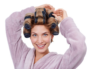 Image showing Portrait, hair and woman with curlers for haircare, routine and smiling in studio for hairstyle. Female person, cosmetic treatment and rollers for grooming, white background and tools for beauty