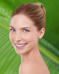 Image showing Woman, beauty and portrait with leaves, skincare or sustainability for organic cosmetics. Girl, person or model with palm tree, plants or wellness with transformation for glow with facial dermatology