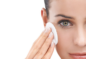 Image showing Woman, hand and pad with makeup, beauty or cosmetics for removal on a white studio background. Closeup, portrait or face of female person or model with cotton for facial treatment on mockup space