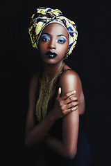Image showing Black woman, beauty and portrait with fashion, skincare and makeup in studio. Cosmetics, trendy and afro style with African female person from Kenya with traditional hair wrap with black background