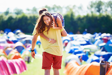 Image showing Love, tent and carrying with couple laughing together outdoor on campsite for travel or vacation. Comic, nature or forest with funny young man and woman walking on grass for summer camping holiday