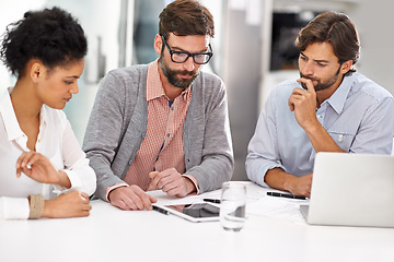 Image showing Creative people, tablet and thinking in meeting for teamwork, planning or online research on table at office. Group of employees in wonder with technology for project plan or startup at workplace