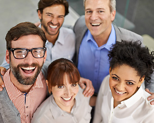 Image showing Businesspeople, portrait and smile in office with confidence from above for collaboration, teamwork or partnership. Men, women and happy at creative agency for startup pride, workspace or together