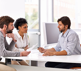 Image showing Business people, meeting and manager talking with staff at desk for planning and data entry specialist. Teamwork, discussion and management of team with professional conversation for company project